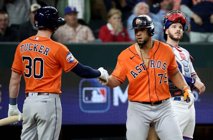 Oct 19, 2023; Arlington, Texas, USA; Houston Astros first baseman Jose Abreu (79) celebrates with right fielder Kyle Tucker (30) after hitting a three-run home run during the fourth inning in game four of the ALCS against the Texas Rangers for the 2023 MLB playoffs at Globe Life Field. Mandatory Credit: Kevin Jairaj-USA TODAY Sports
